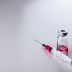 Red,Liquid,(vitamin,B12),In,A,Disposable,Syringe,With,A